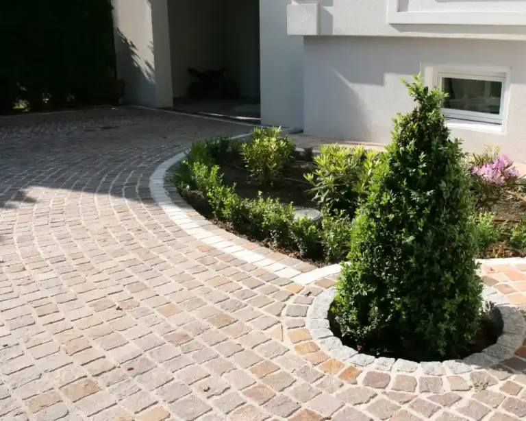 Porphyr - Kleinstein Einfahrt - Stein und Gartendesign
